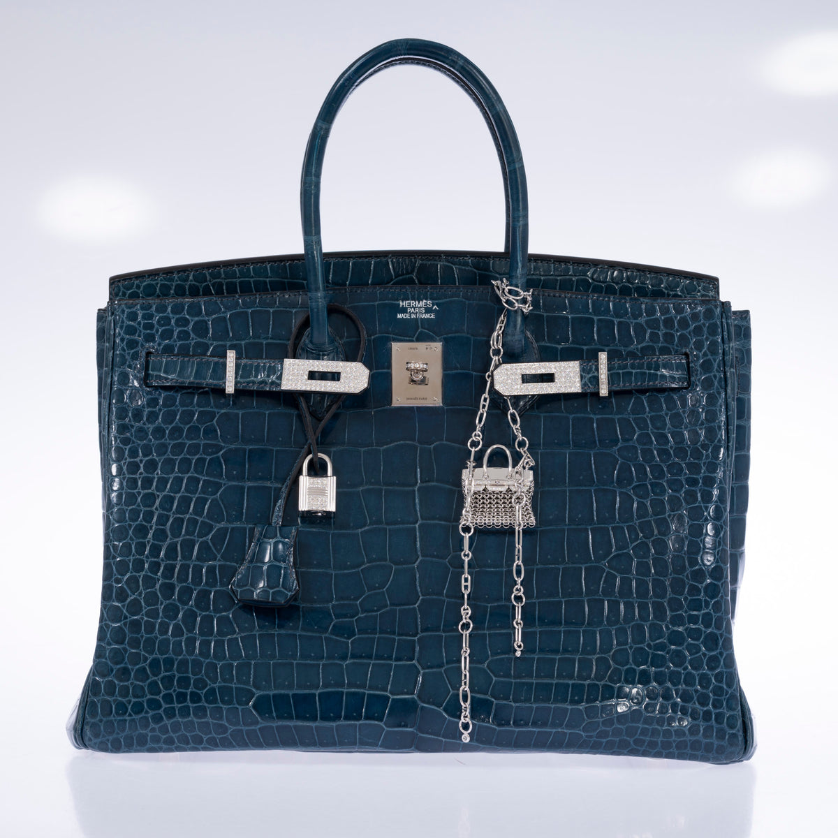 Hermès Birkin Bijou Précieux 18K White Gold Diamond Chain Mail Necklace, shown clipped as a bag charm to a crocodile Birkin, bag sold separately