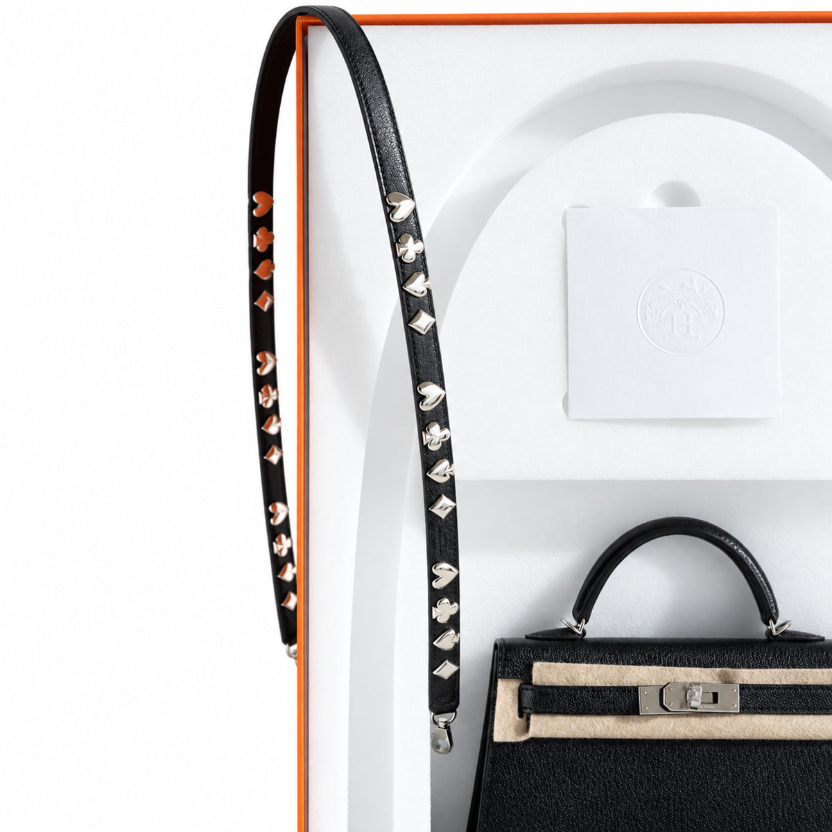 Hermès Clou de Coeur Kelly 20 Mini II Sellier Noir Chèvre Chamkila Palladium Hardware, studded strap with the Hermès box