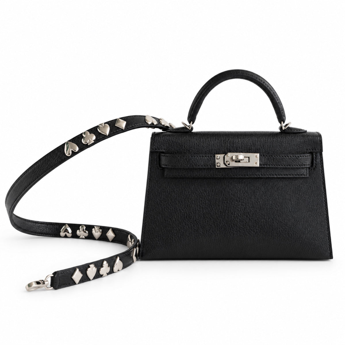 Hermès Clou de Coeur Kelly 20 Mini II Sellier Noir Chèvre Chamkila Palladium Hardware, front view with the studded strap laid out