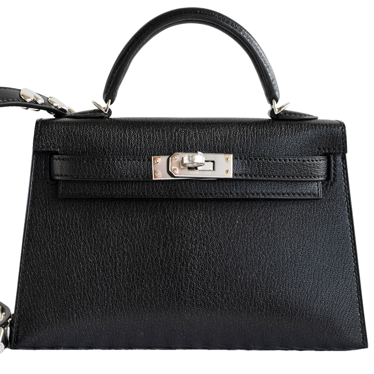 Hermès Clou de Coeur Kelly 20 Mini II Sellier Noir Chèvre Chamkila Palladium Hardware, front detail of the turnlock and grained goatskin