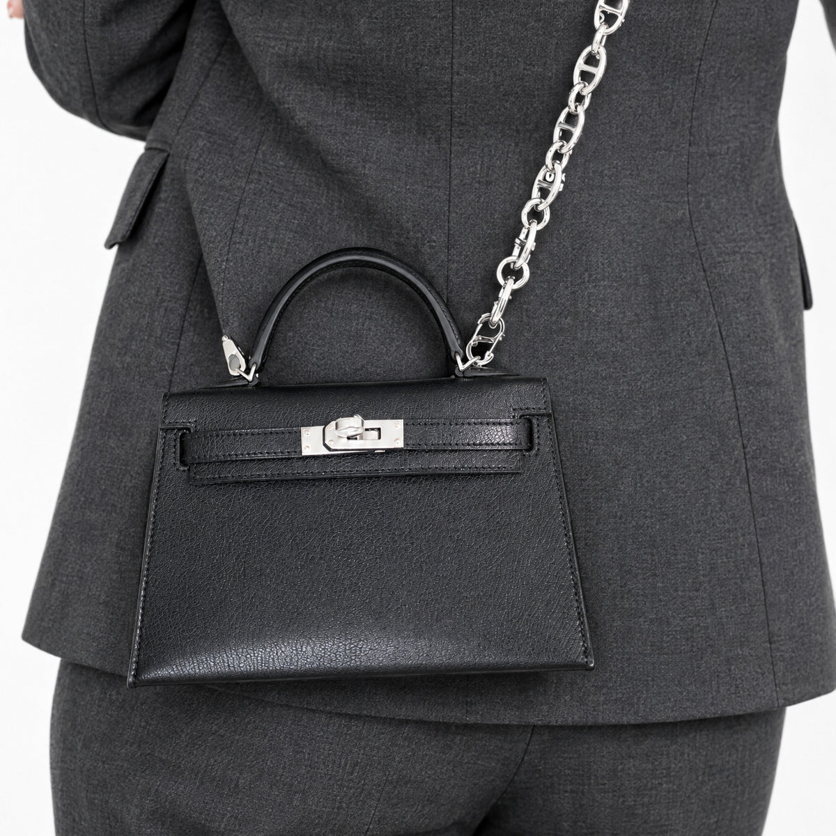 Hermès Clou de Coeur Kelly 20 Mini II Sellier Noir Chèvre Chamkila Palladium Hardware, back detail on the JANEFINDS Convertible Triple Mariner Extender, sold separately