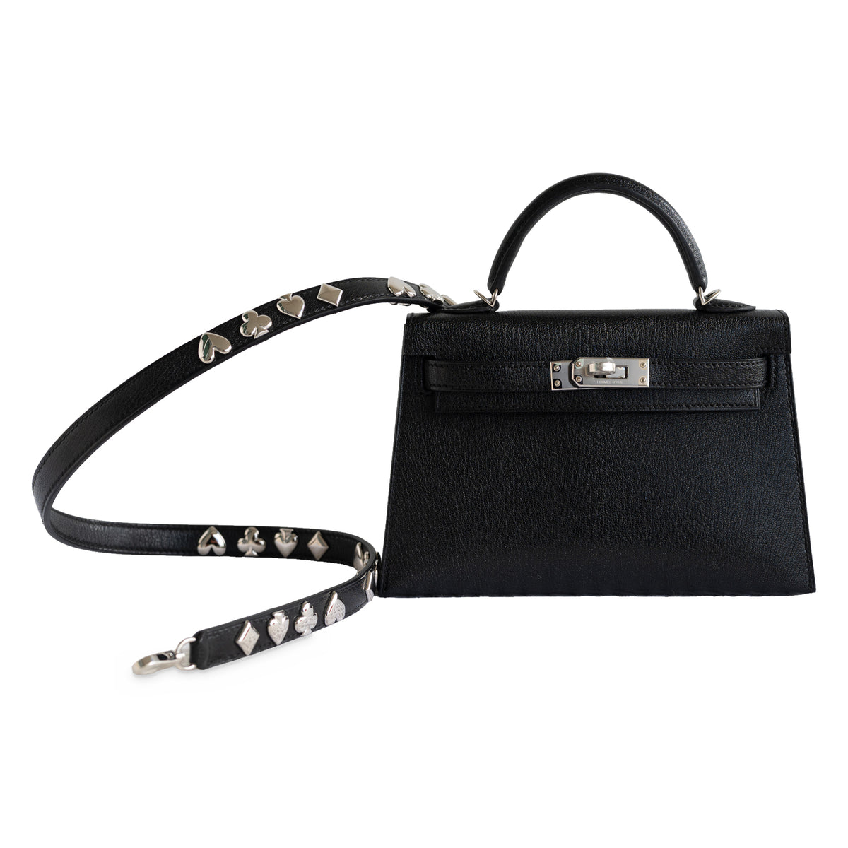 Hermès Clou de Coeur Kelly 20 Mini II Sellier Noir Chèvre Chamkila Palladium Hardware, front view with the studded strap laid out