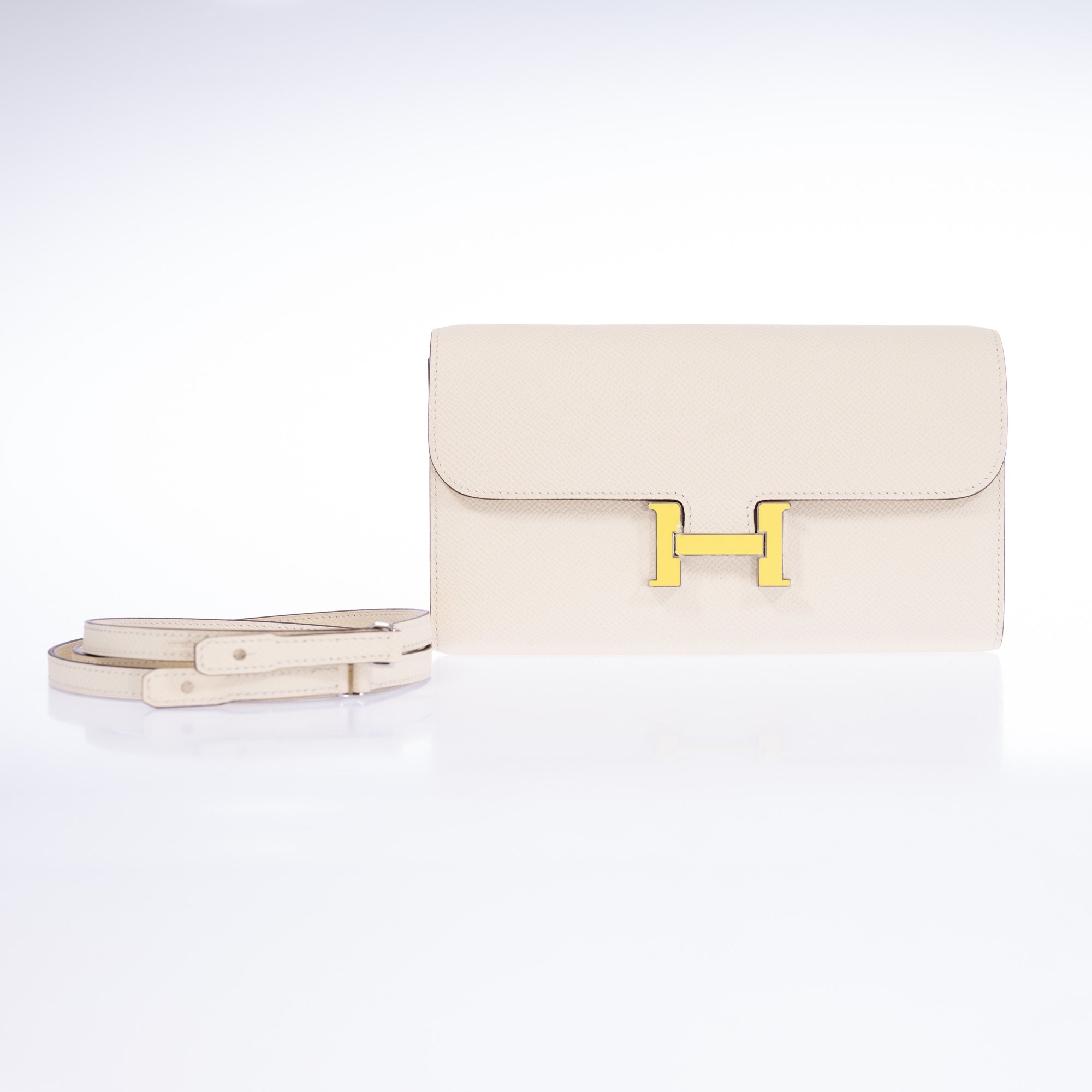 HERMES縄跳び(収納袋付き) Hermès Constance Long To Go Wallet Nata with Jaune Citron Enamel