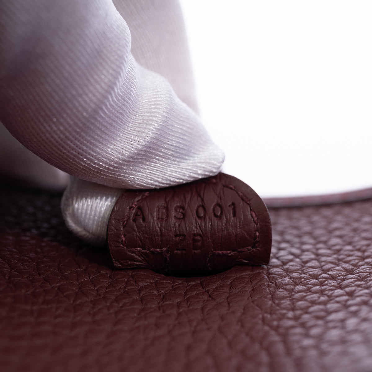 Hermès Evelyne 16 TPM Amazone Bordeaux Clémence Palladium Hardware, A date stamp detail