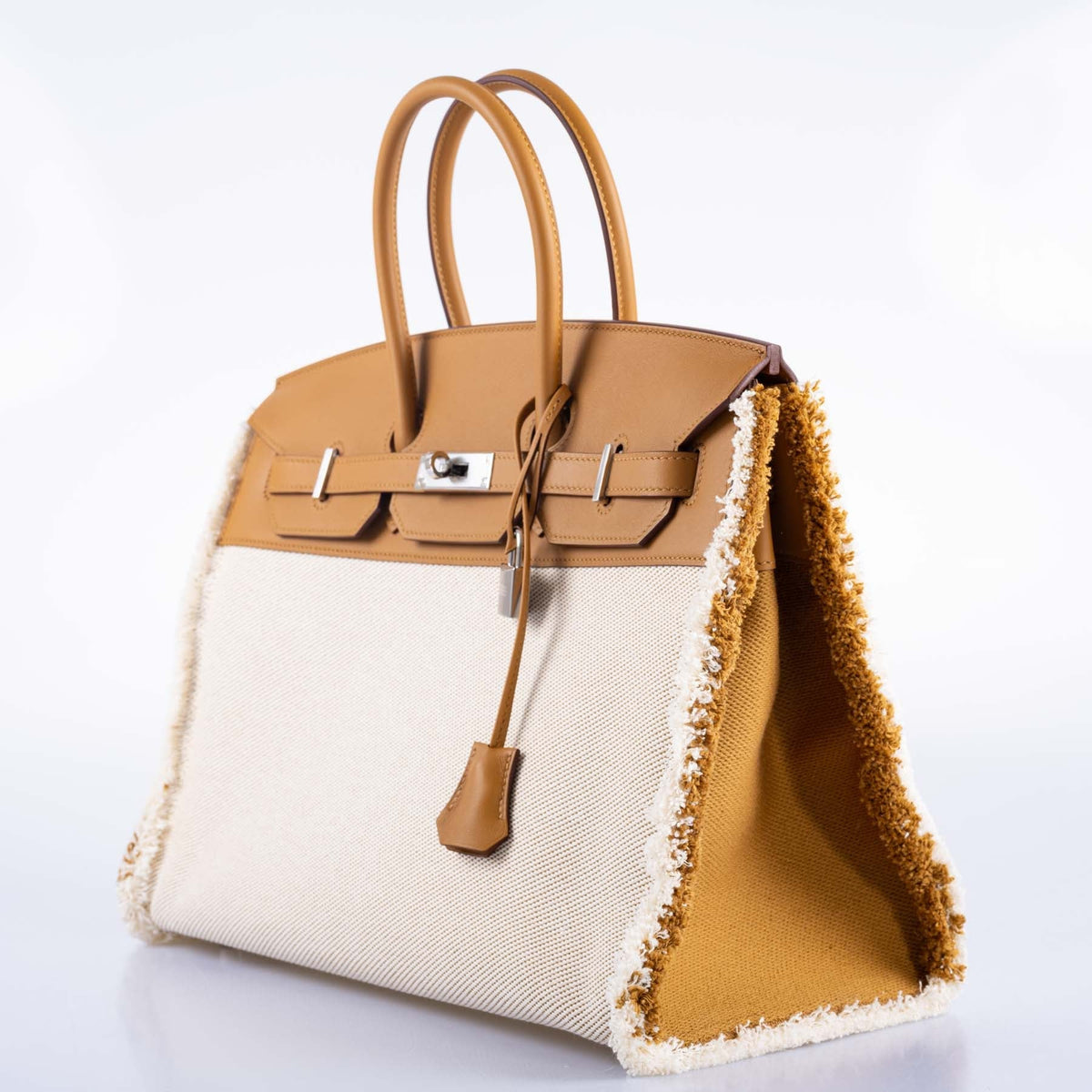 Hermès Fray Fray Birkin 35 Sesame Swift and Toile H with Palladium Hardware, three-quarter view from the right