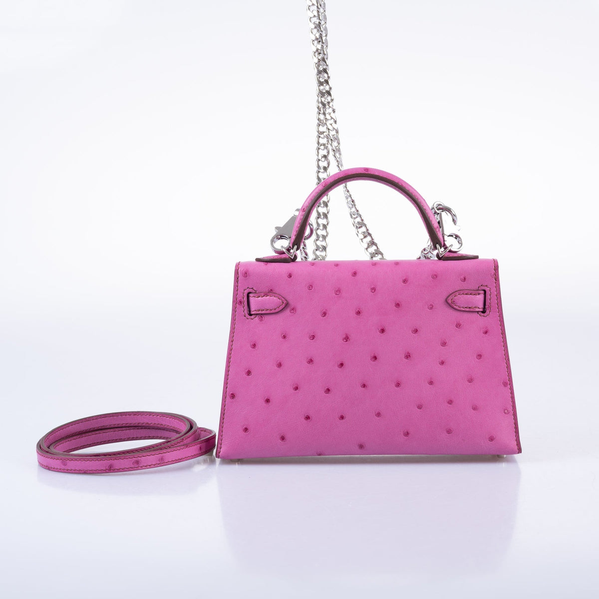 Hermès Kelly 20 Mini II Sellier Rose Tyrien Ostrich Palladium Hardware, rear view with chain and leather shoulder strap