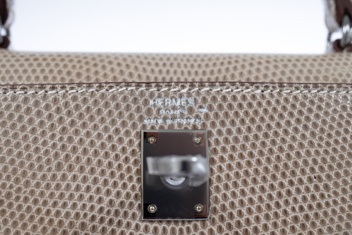 Hermès Paris Made in France heat stamp and ruthenium lock plate under the flap of the Kelly 25 Sellier Ficelle Shiny Salvator Lizard