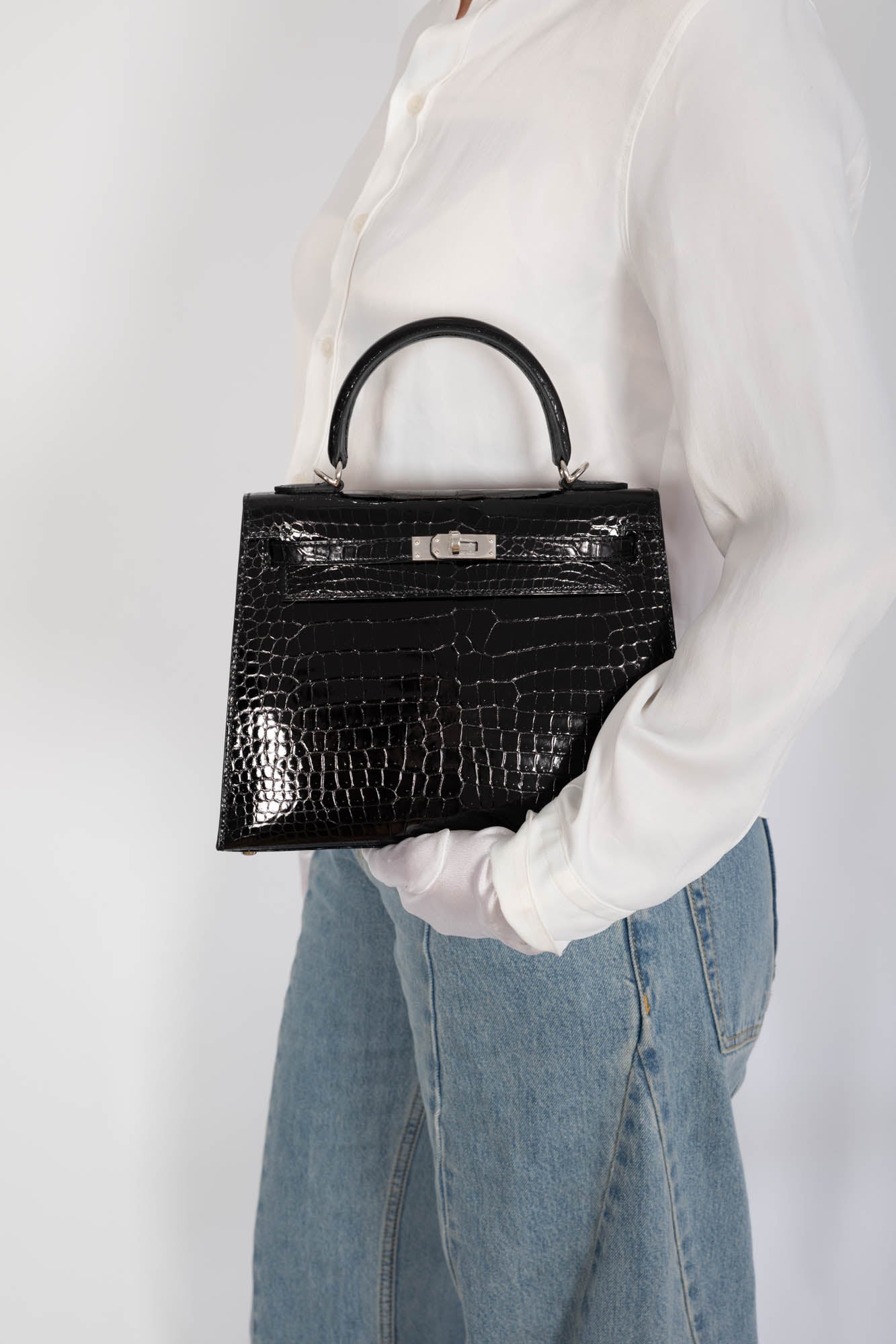 Hermès Kelly 25 Sellier Noir Shiny Porosus Crocodile Palladium Hardware