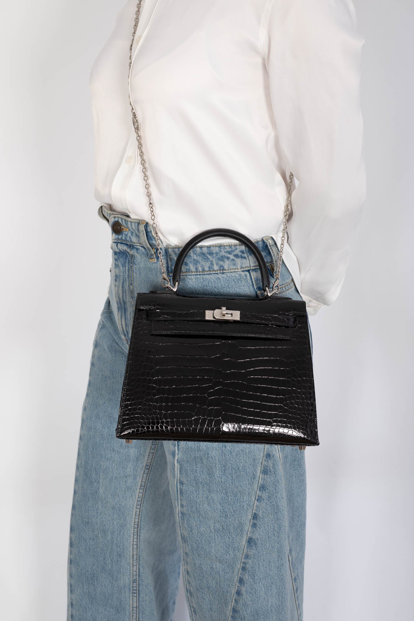 Hermès Kelly 25 Sellier Noir Shiny Porosus Crocodile Palladium Hardware