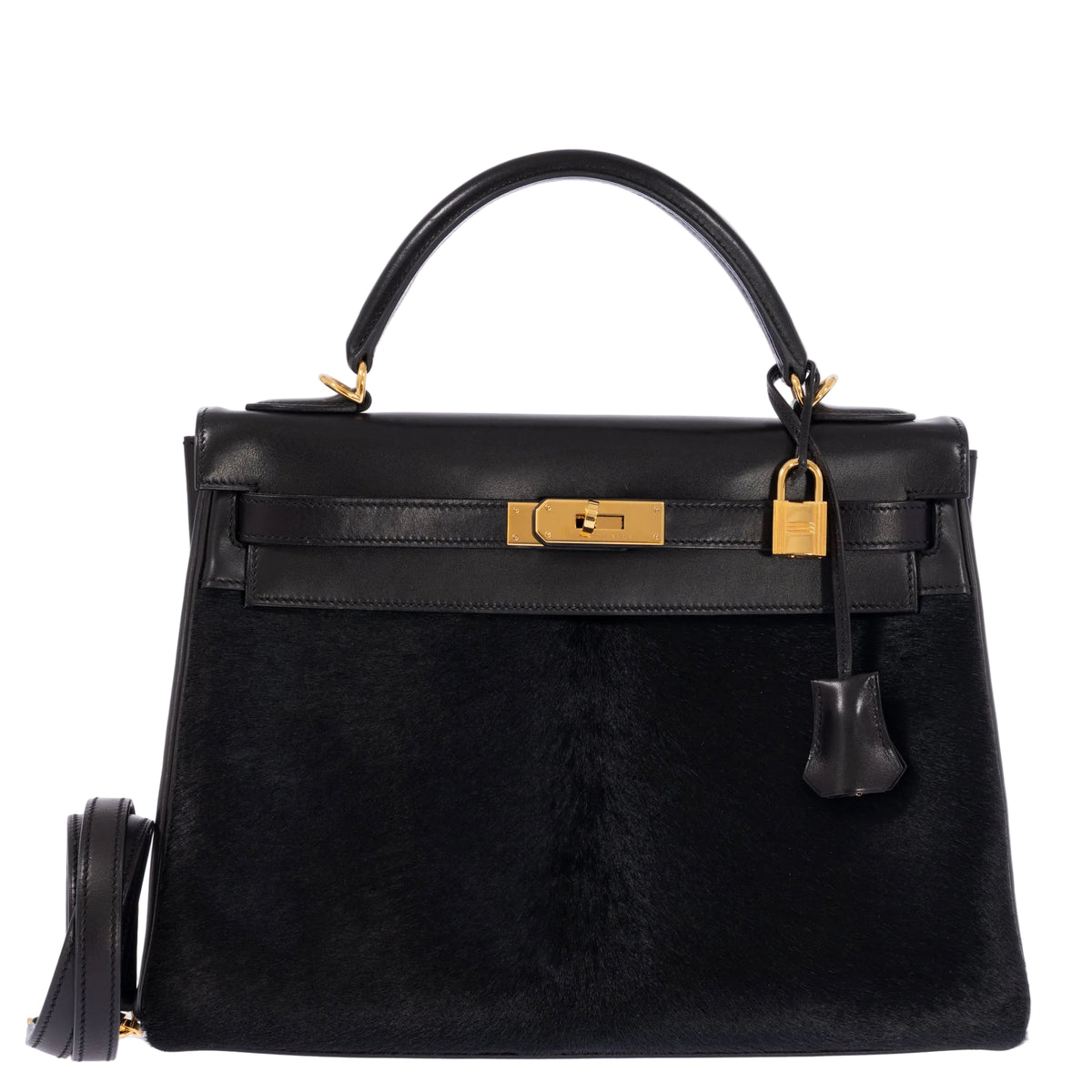 Hermès Kelly 32 Noir Box leather and pony skin with Gold hardware, closed front view with lock, clochette and detachable shoulder strap.