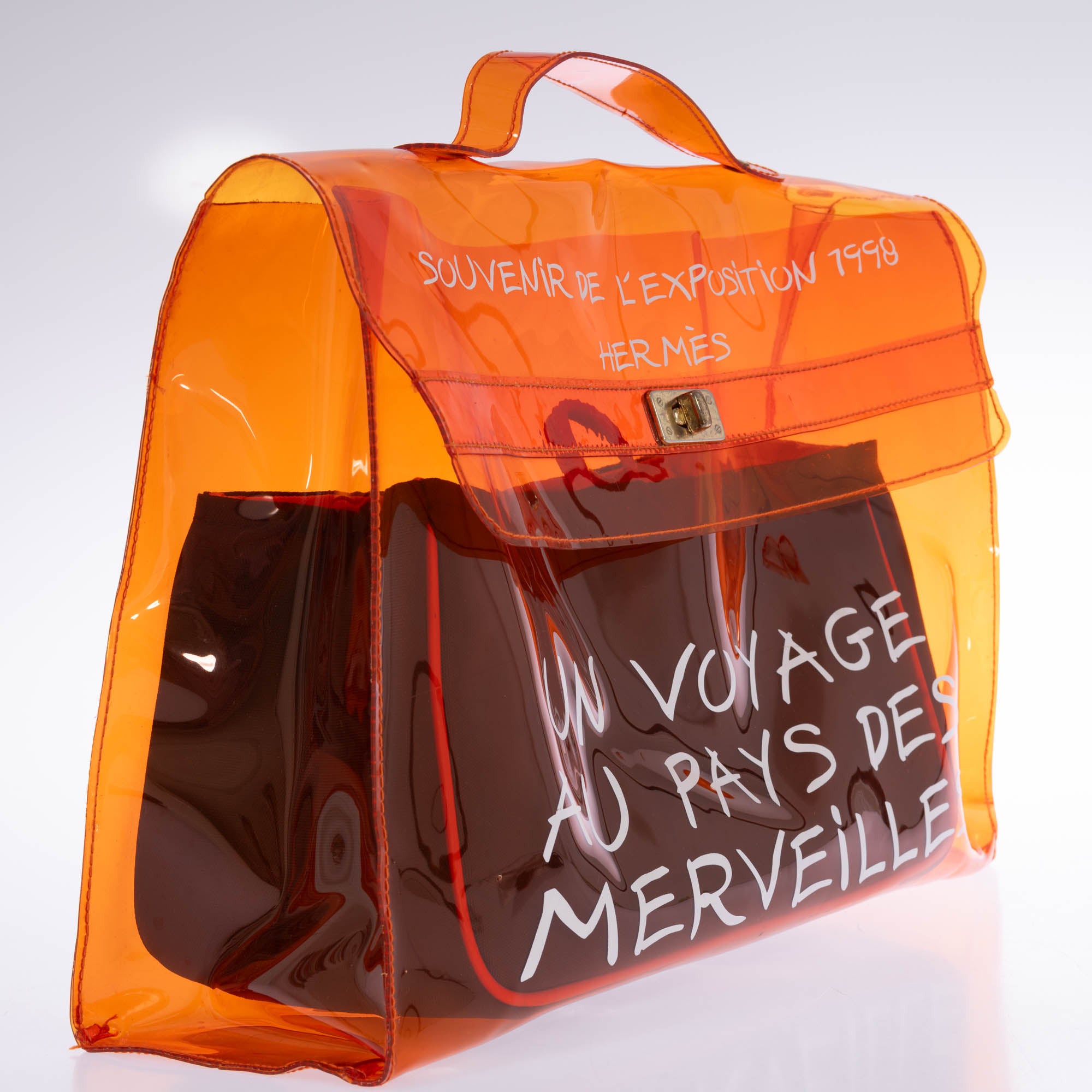 Hermès Kelly 40 Orange Translucent Vinyl Souvenir de l'Exposition 1998 bag, angled front view
