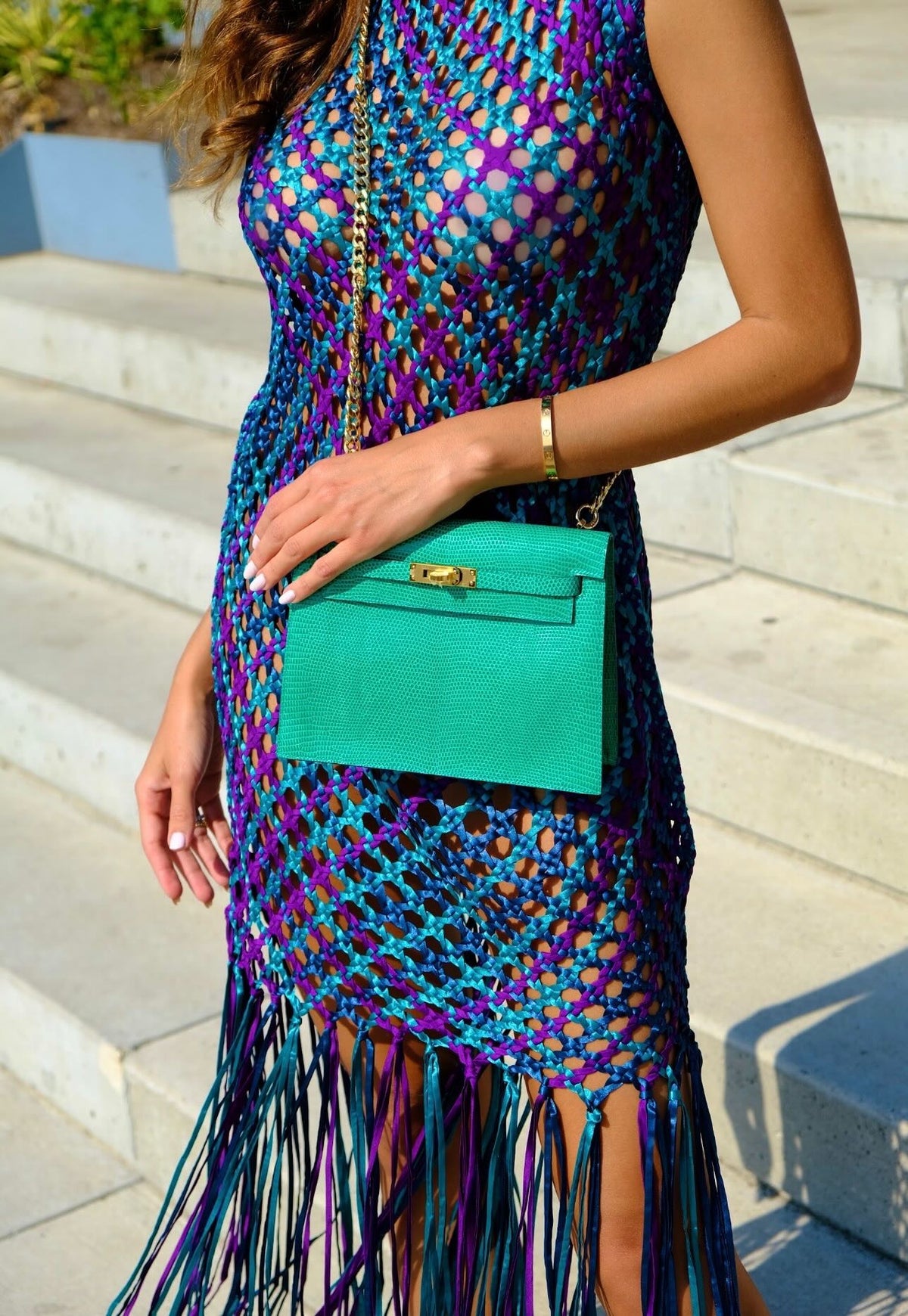 Hermès Kelly Danse II Menthe Shiny Nilo Lizard Gold Hardware, worn on a chain by a model