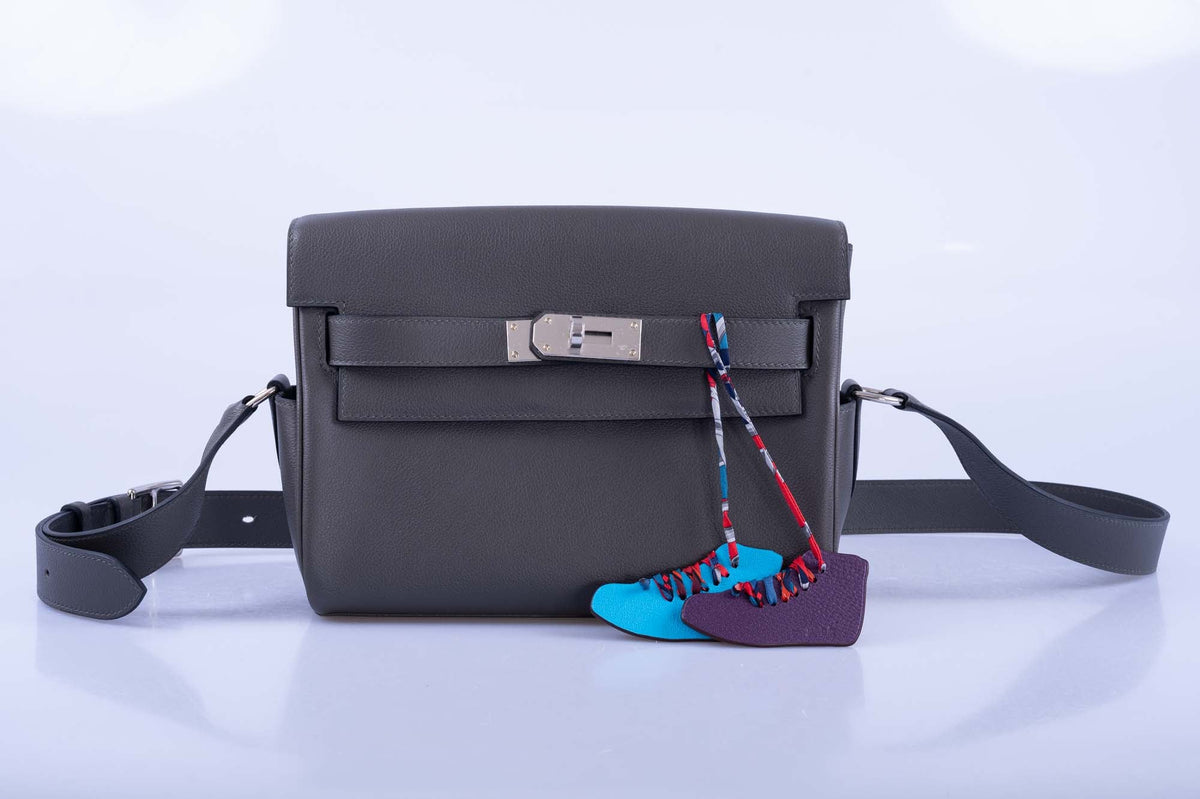 Hermès Kelly Messenger PM Gris Misty Evercolor Palladium Hardware, front view with the shoulder strap, styled with two charms, sold separately