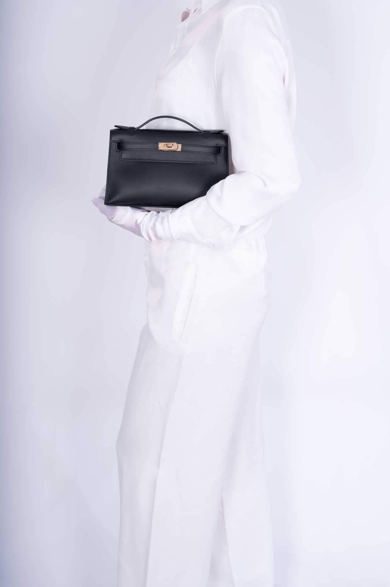 Hermès Kelly Mini Pochette Noir Swift Permabrass Hardware