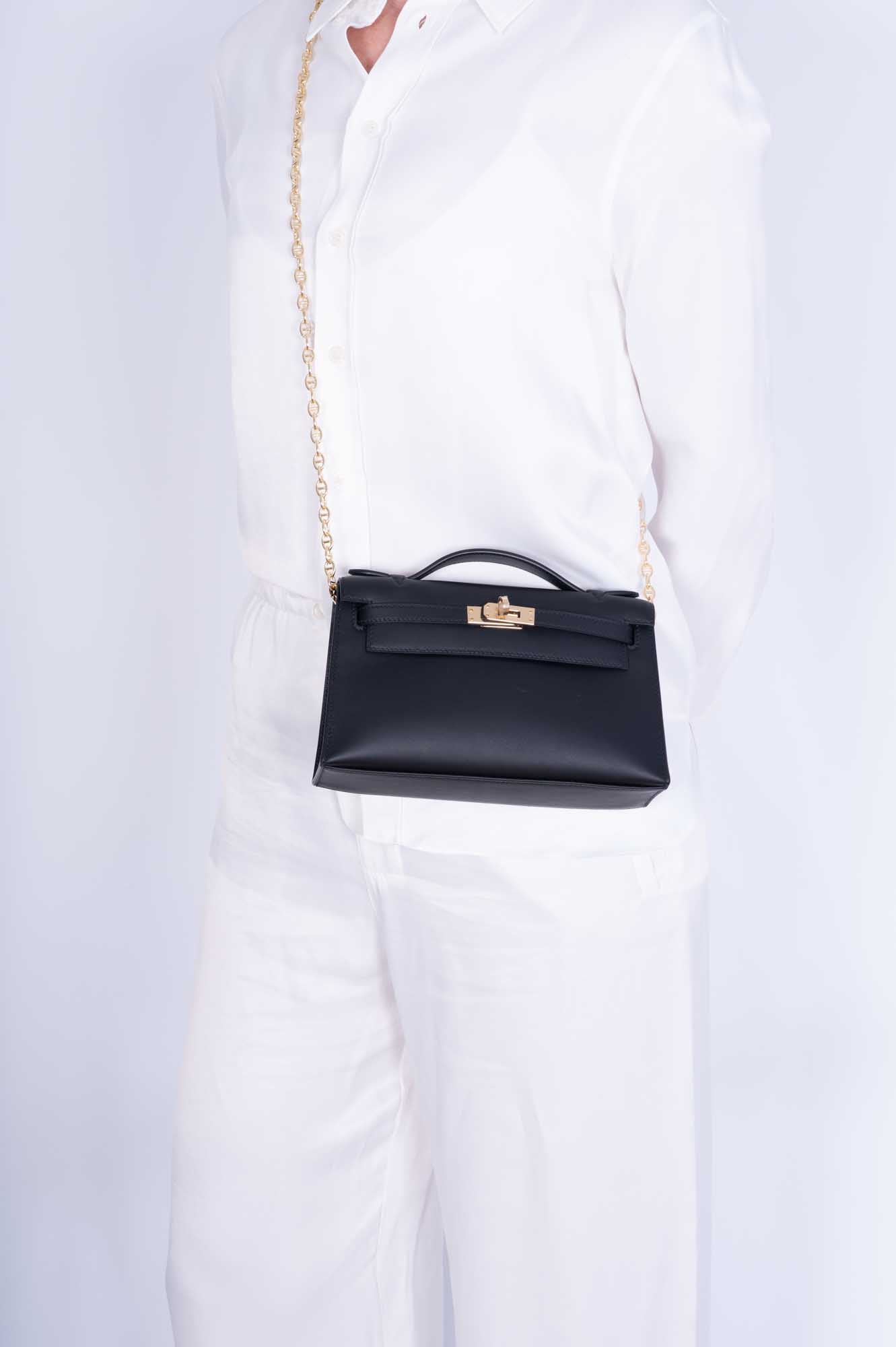 Hermès Kelly Mini Pochette Noir Swift Permabrass Hardware