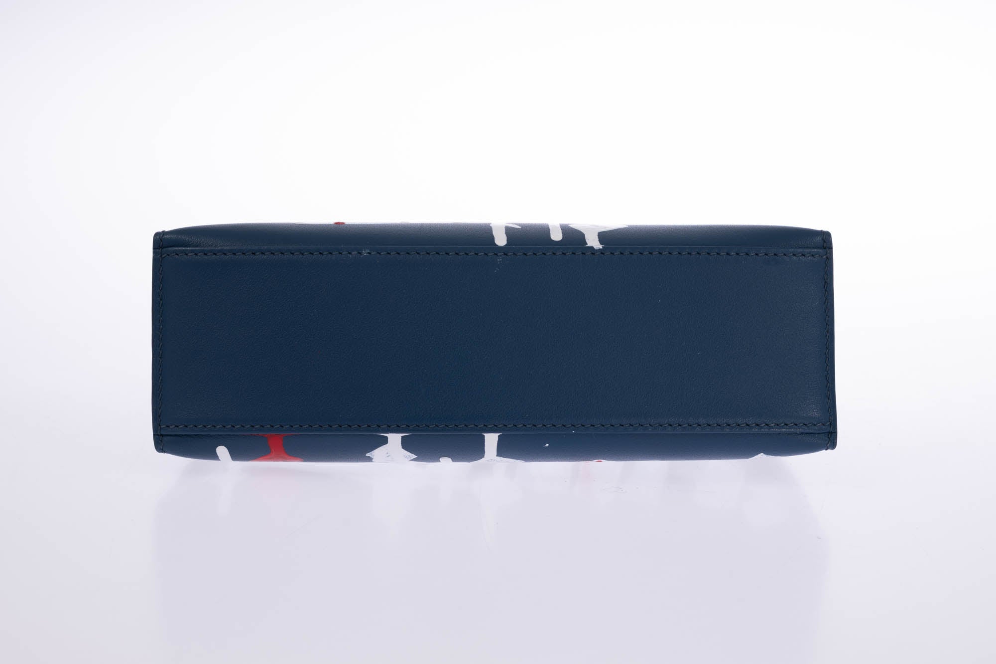 Hermès Kelly Pochette Bleu Nuit Swift Retna Artist Collaboration Gold Hardware