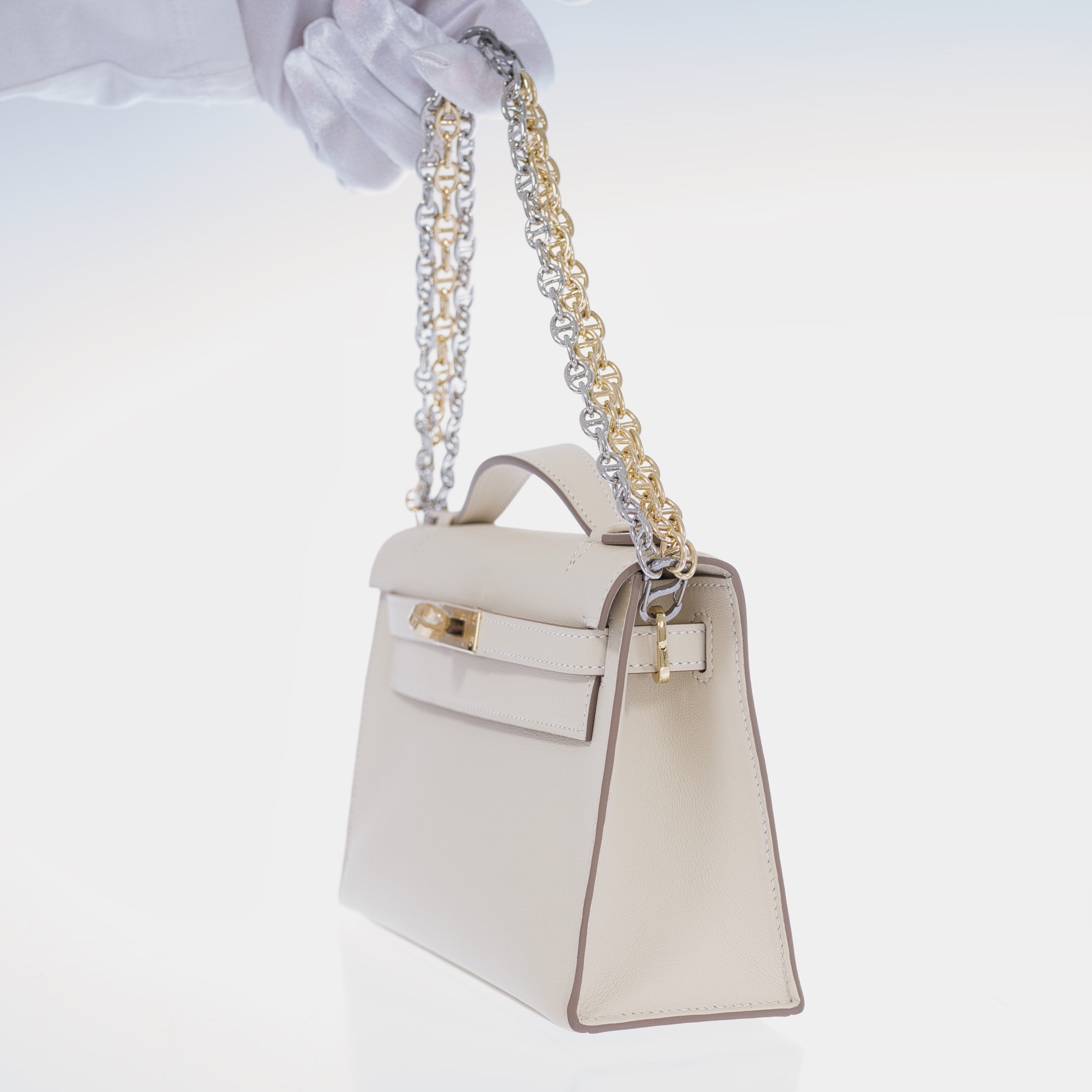 Hermès Kelly Pochette Craie Swift with Permabrass Hardware
