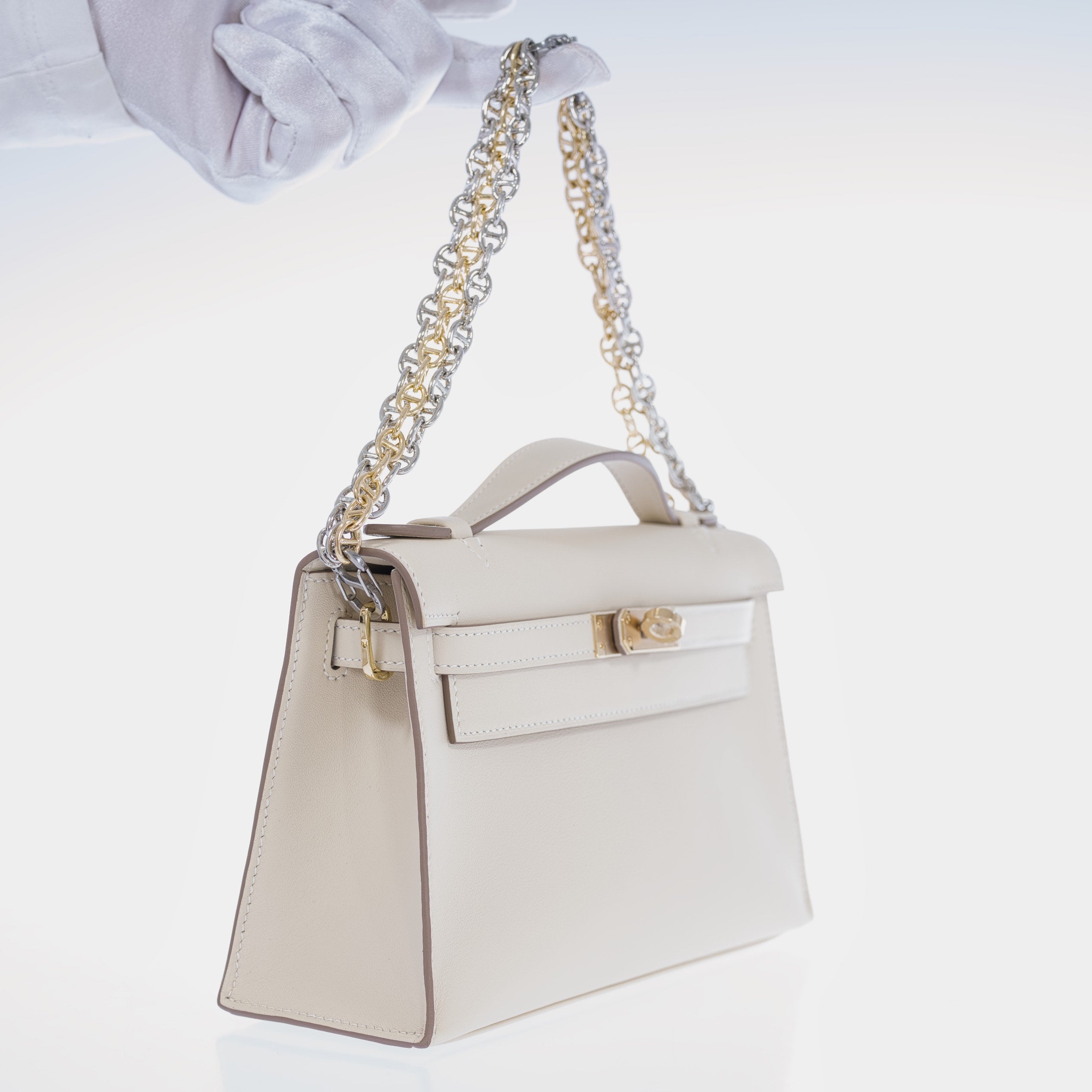 Hermès Kelly Pochette Craie Swift with Permabrass Hardware