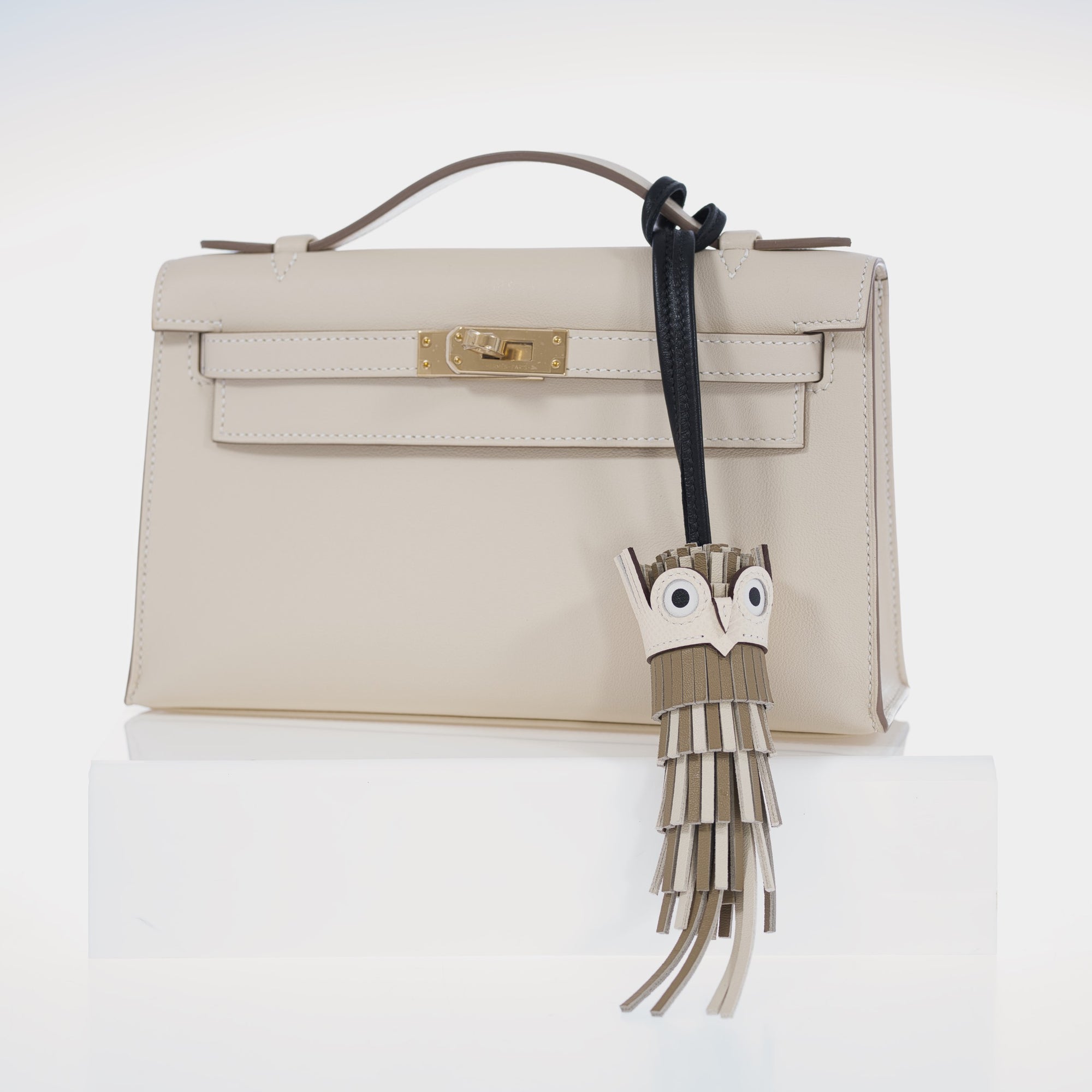 Hermès Kelly Pochette Craie Swift with Permabrass Hardware