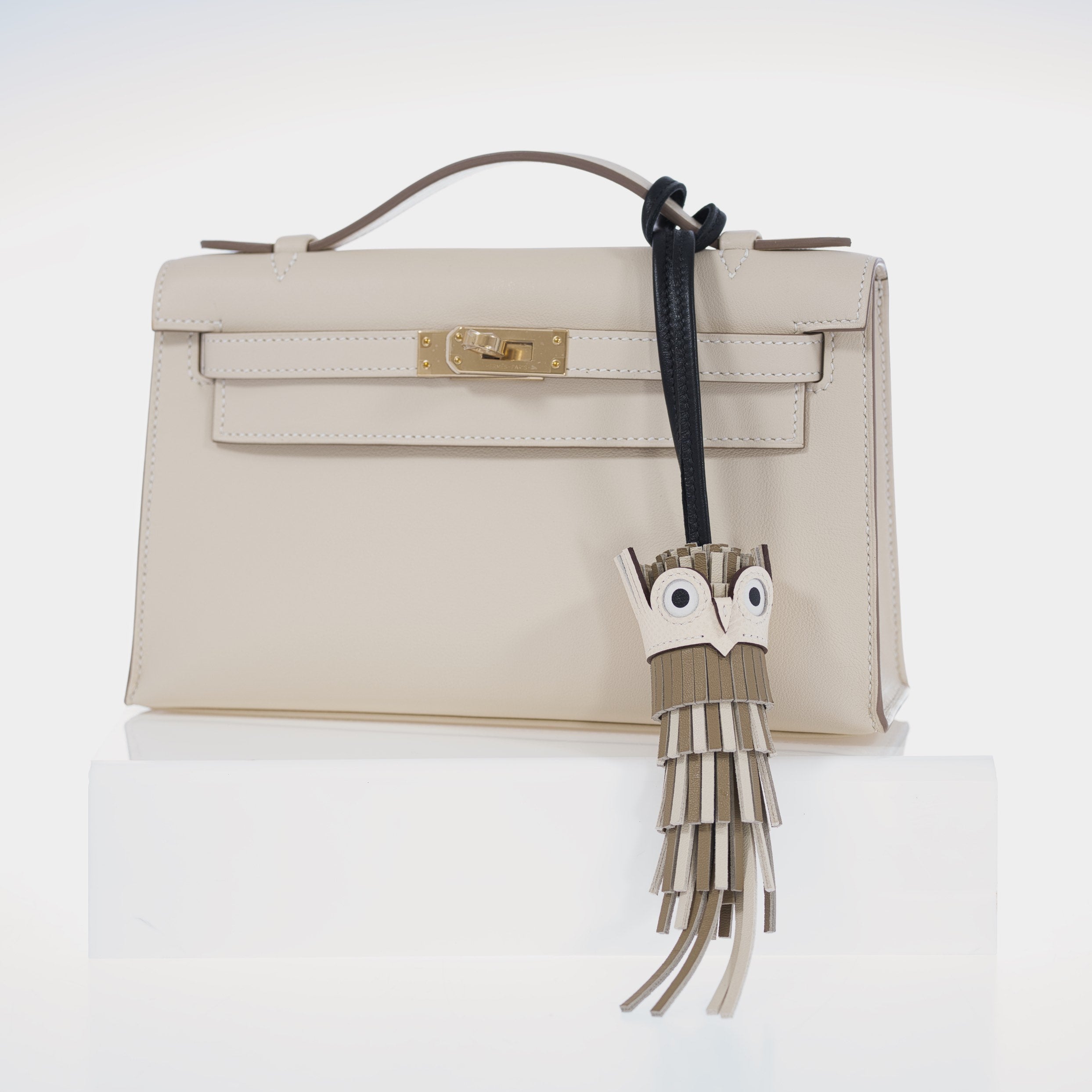 Hermès Kelly Pochette Craie Swift with Permabrass Hardware