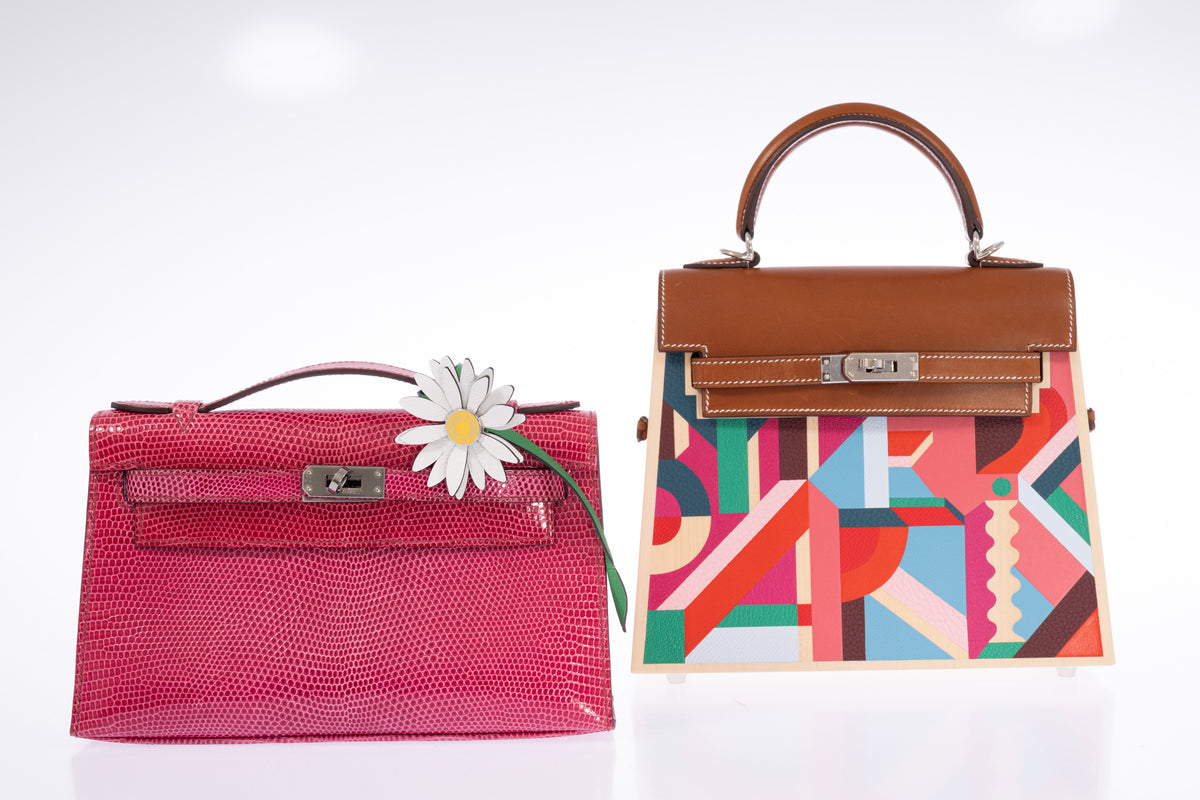 Hermès Kelly Pochette Fuchsia Shiny Niloticus Lizard Palladium Hardware, shown beside a multicolor Kelly that is not included, styled with a daisy charm, sold separately