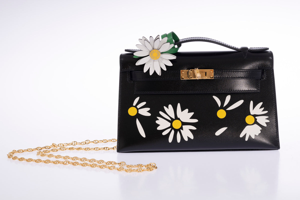 Hermès Kelly Pochette Marqueterie Marguerite Noir Box Gold Hardware, shown with a shoulder chain, chain sold separately