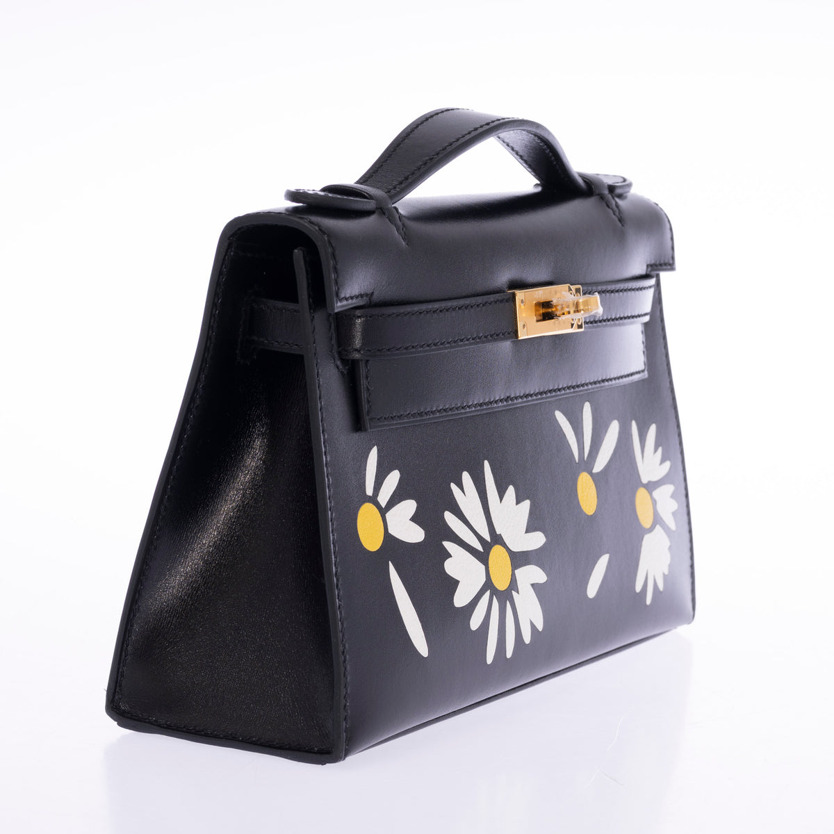Hermès Kelly Pochette Marqueterie Marguerite Noir Box Gold Hardware, three-quarter view from the left