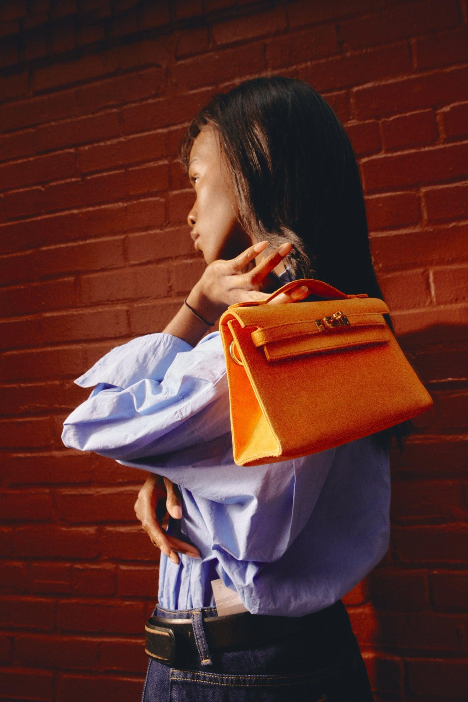 Hermès Kelly Pochette Orange H Veau Doblis Suede with Gold Hardware