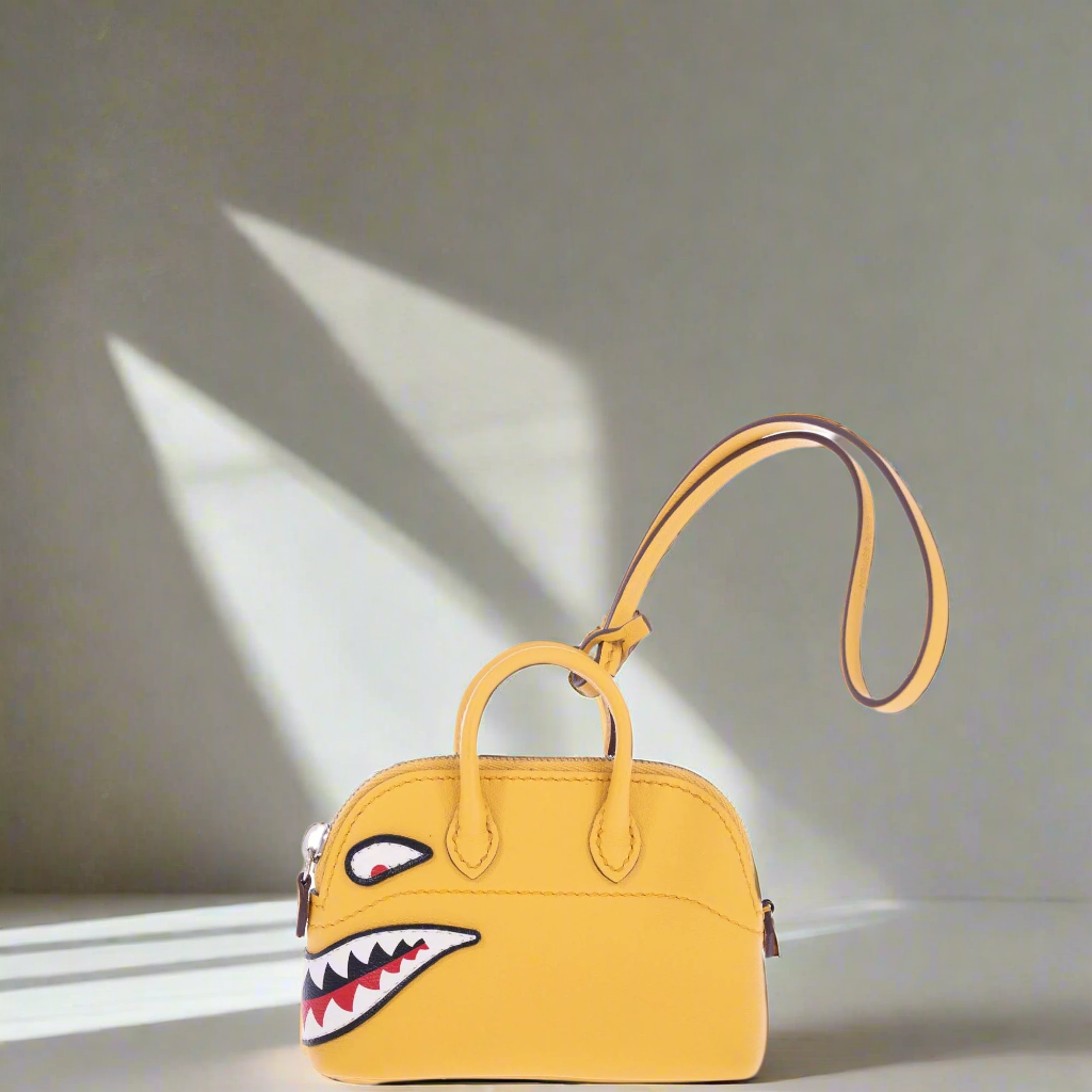 Hermès Micro Bolide Shark Bag Charm Sun Swift Palladium Hardware