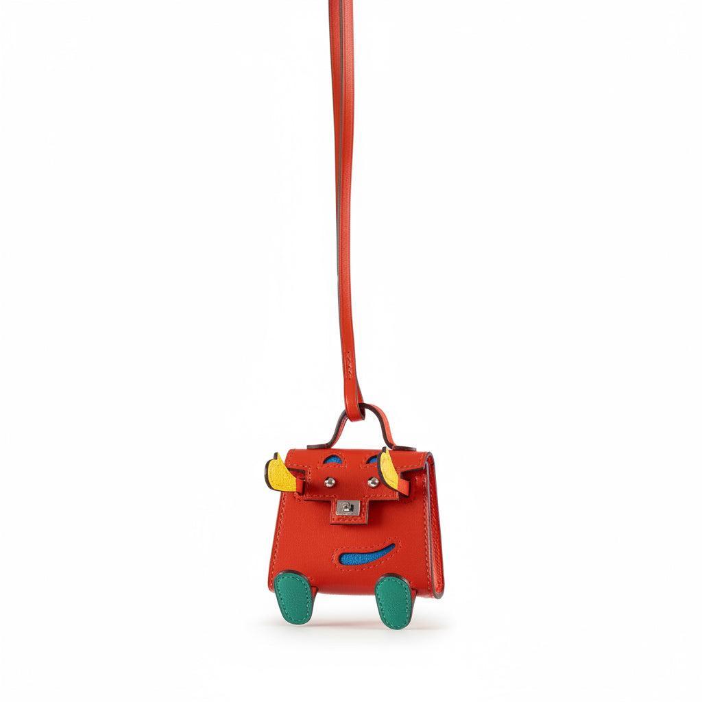 Hermès Micro Kelly Quelle Idole Bag Charm Capucine / Jaune de Naples / Vert Vertigo / Zanzibar Tadelakt Palladium Hardware