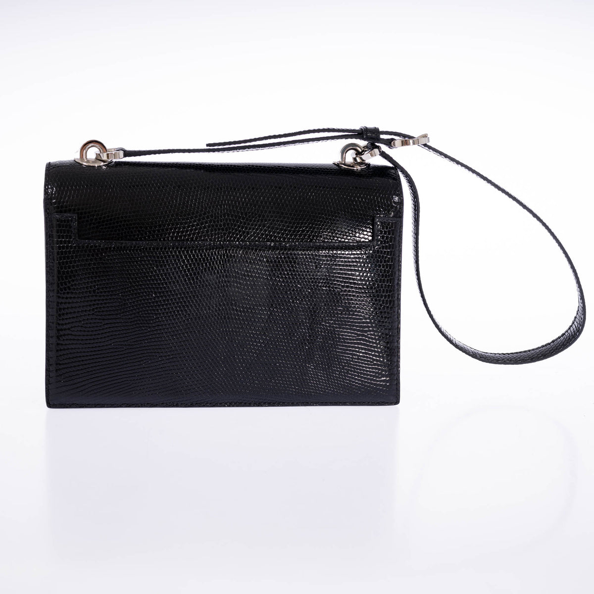 Hermès Minuit au Faubourg 20 in Noir lizard, back view with the shoulder strap and its palladium fittings.
