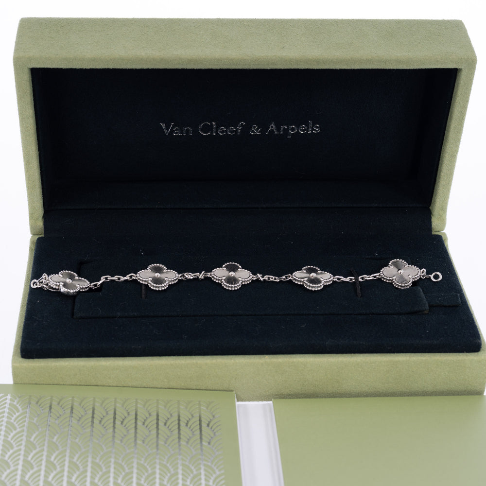 Van Cleef & Arpels Vintage Alhambra 5-Motif Guilloché Bracelet 18K White Gold, front view in its presentation box