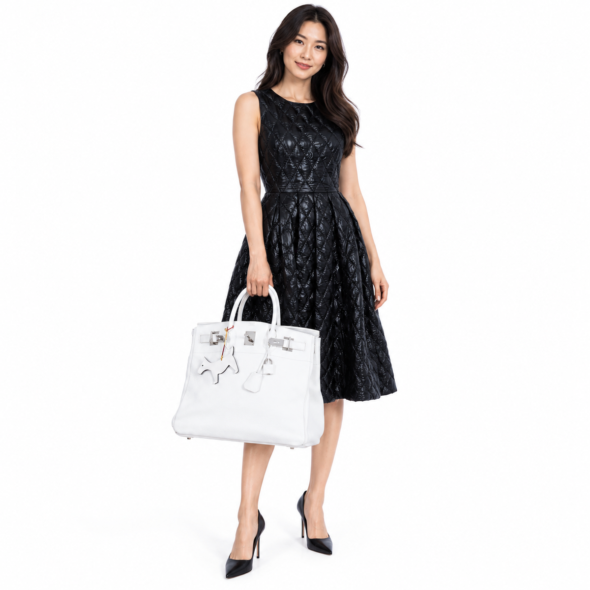 Hermès Birkin 40 HAC White Togo Palladium Hardware shown on a model