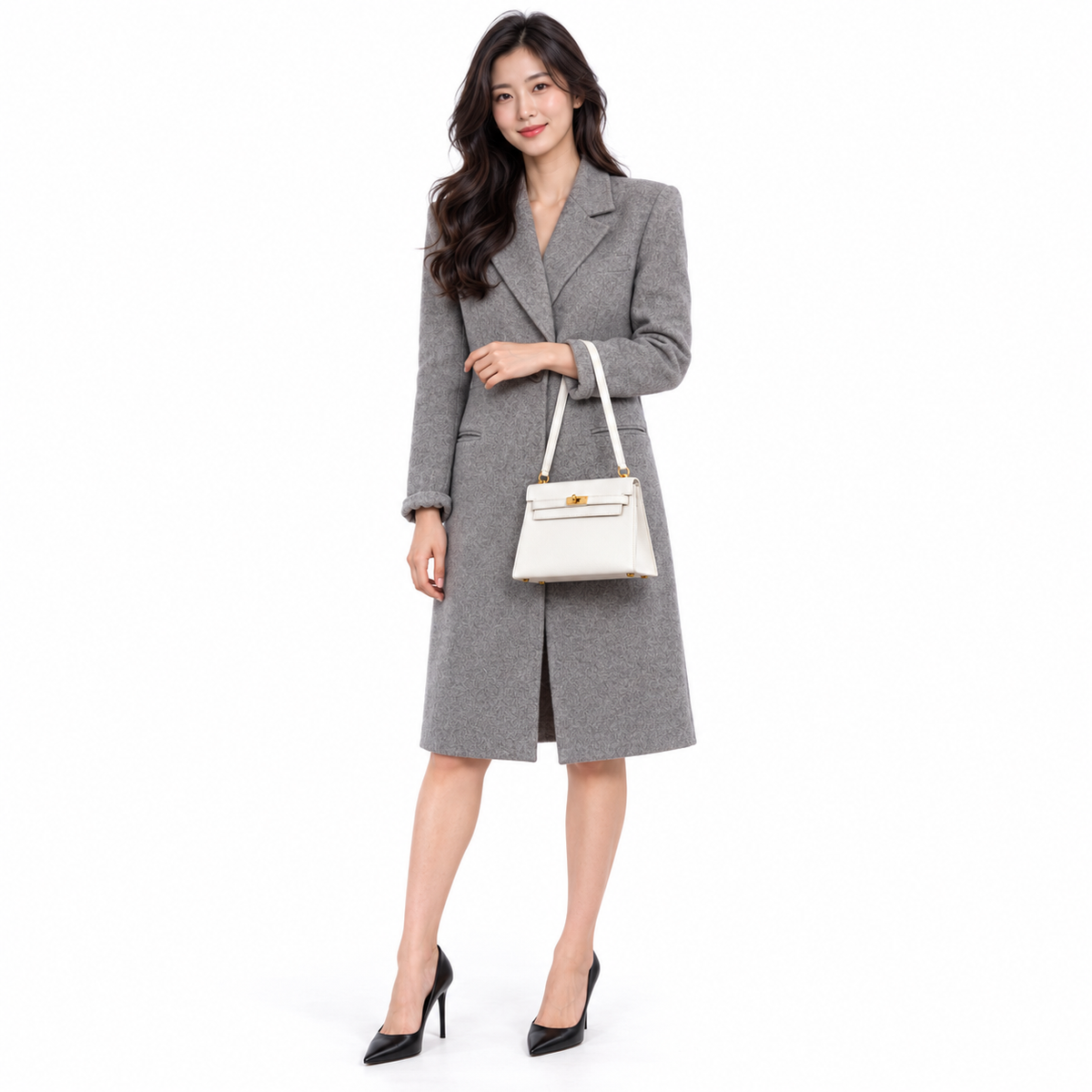Hermès Kelly 20 Mini Sellier Shoulder White Evercolor Gold Hardware - 1986 shown on a model