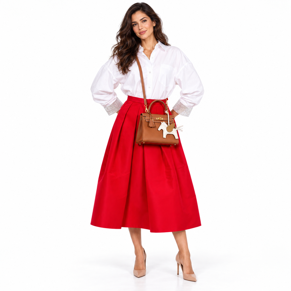 Hermès Kelly 25 Retourne Gold Togo Gold Hardware modeled in a white studio