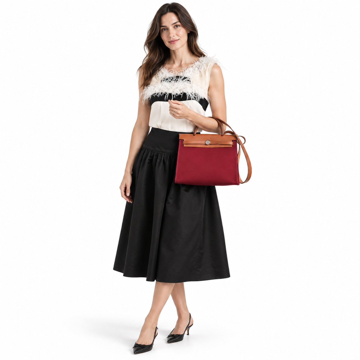 Hermès Herbag Zip 31 PM Rouge Grenat Vache Hunter Toile Natural Palladium modeled in a white studio