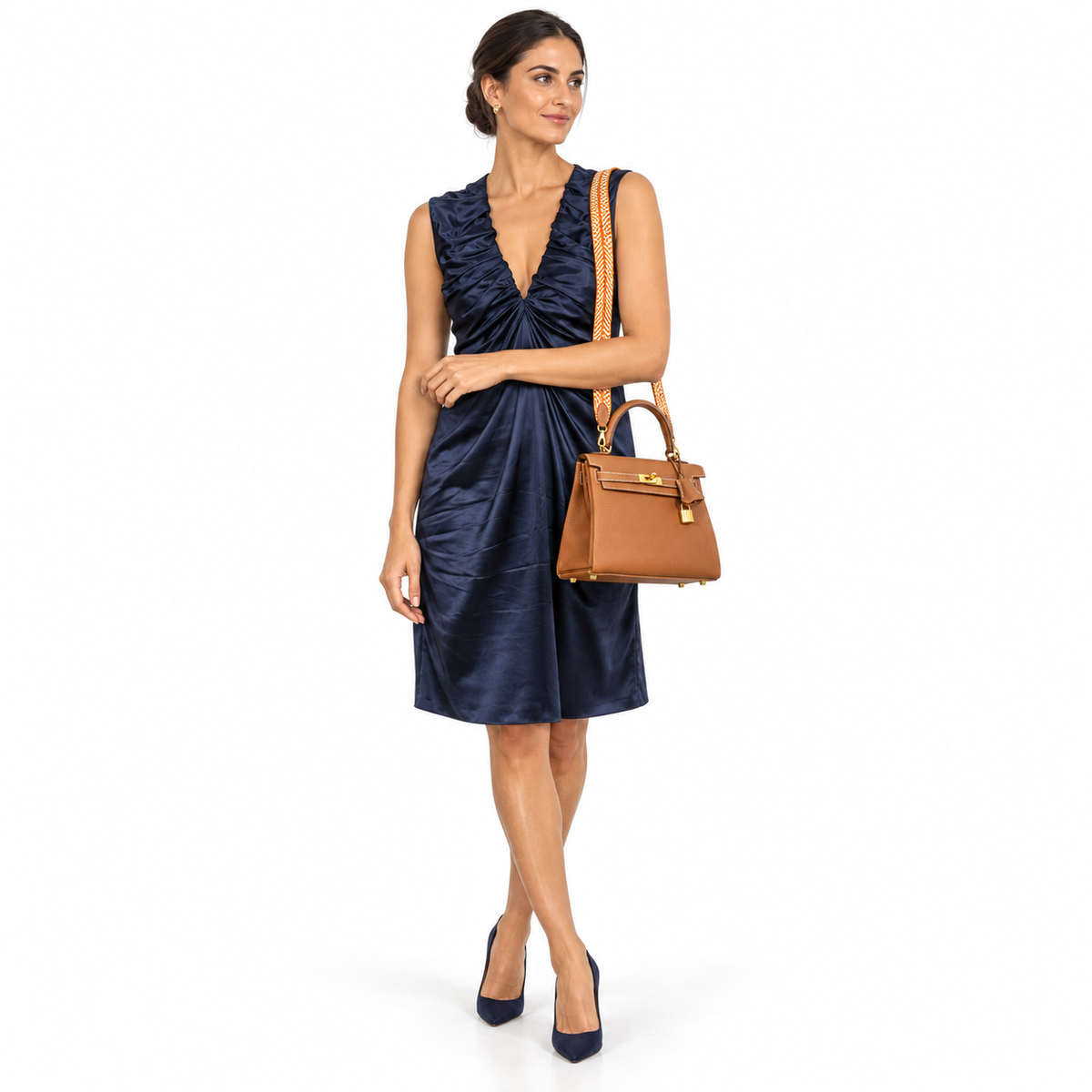 Hermès Kelly 25 Retourne Gold Togo Gold Hardware - 2021, Z shown on a model