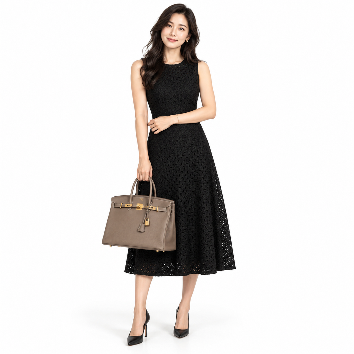 Hermès Birkin 35 Etoupe Togo Gold Hardware shown on a model