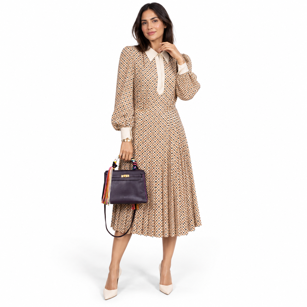 Hermès Kelly 25 Retourne Raisin & Cyclamen Epsom with Gold Hardware shown on a model