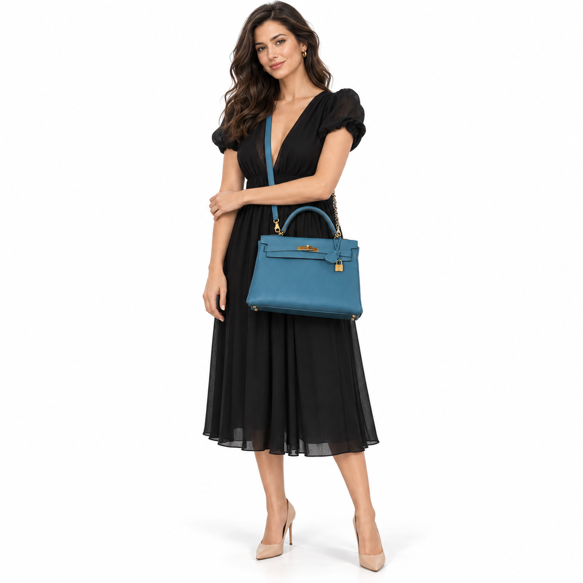 Hermès Kelly 32 Retourne Blue Cobalt Togo Gold Hardware shown on a model