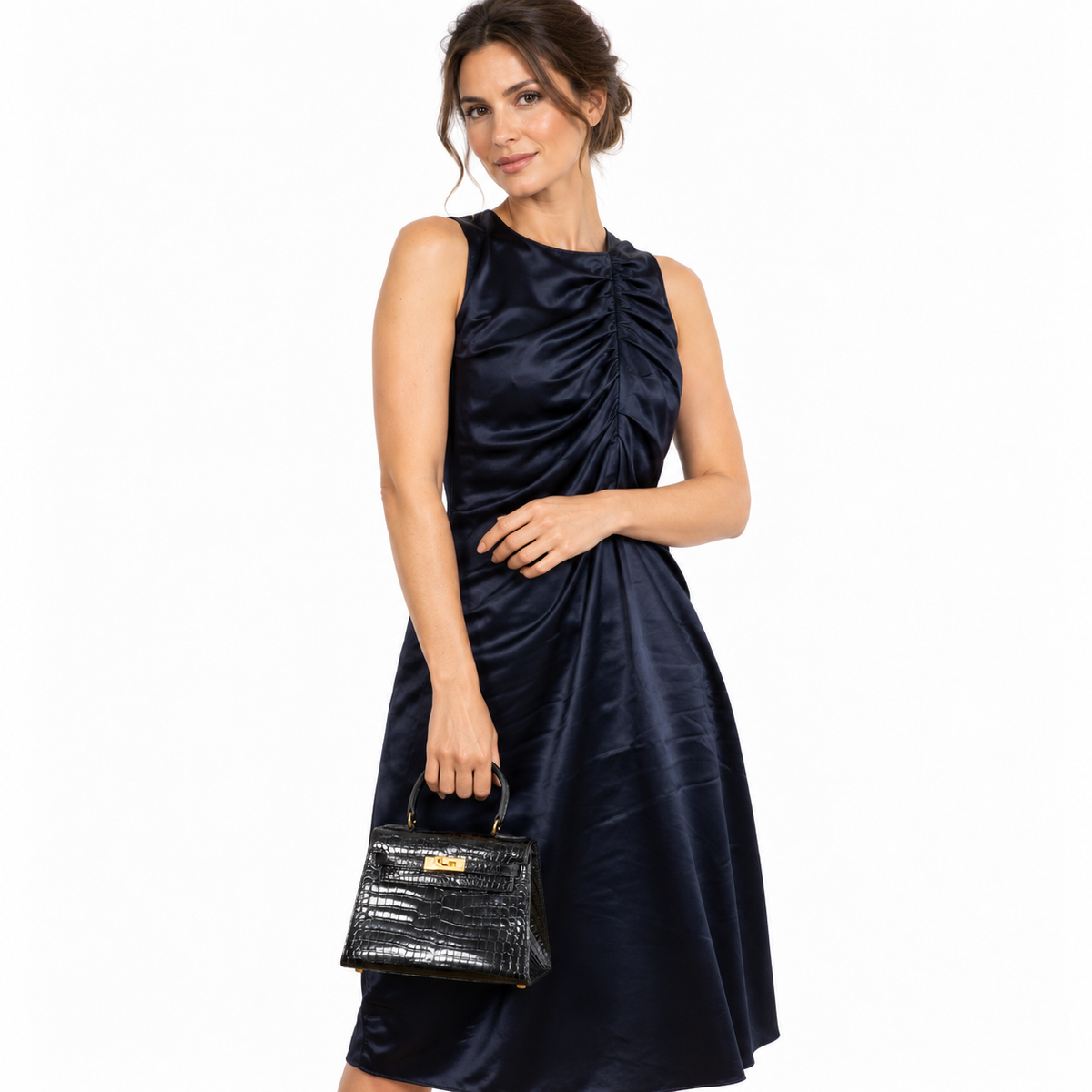 Hermès Kelly 20 Sellier Shiny Black Porosus Crocodile Gold Hardware - 1991 shown on a model