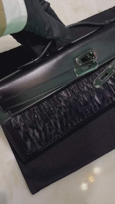 An Exceptional Hermès Kelly Cut SO-BLACK Calf Box Leather with Feathers  Black PVD Hardware